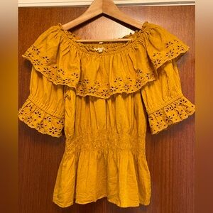 Cotton eyelet-trimmed off-shoulder top